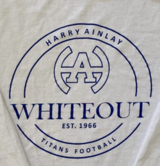 Close up look at a white t-shirt that says Harry Ainlay Whiteout