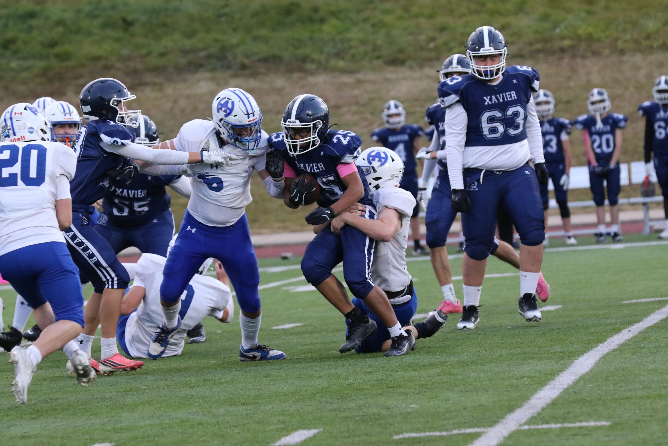 Junior Titans vs. St. Francis Xavier, Oct 7: big tackle coming